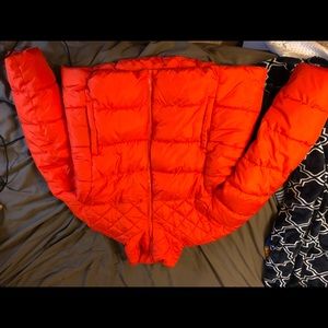 Bright orange Old Navy bubble winter coat